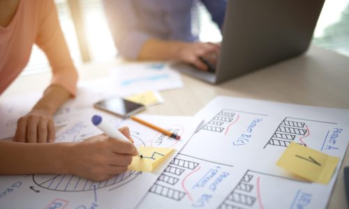 Business team preparing charts and graphs for presentation