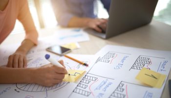 Business team preparing charts and graphs for presentation